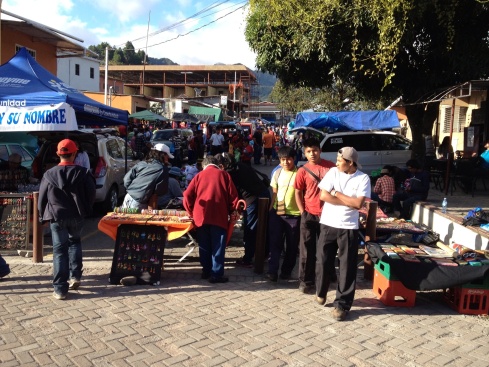 View of street vendors on a pedestrian street running north from Central Park.